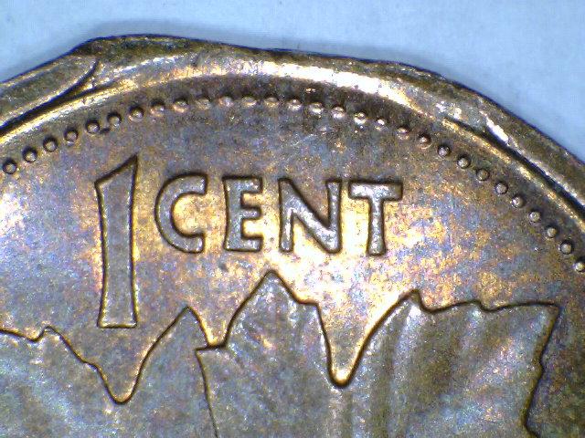 NY-First-12-Sided-Canadian-Cent-Clip